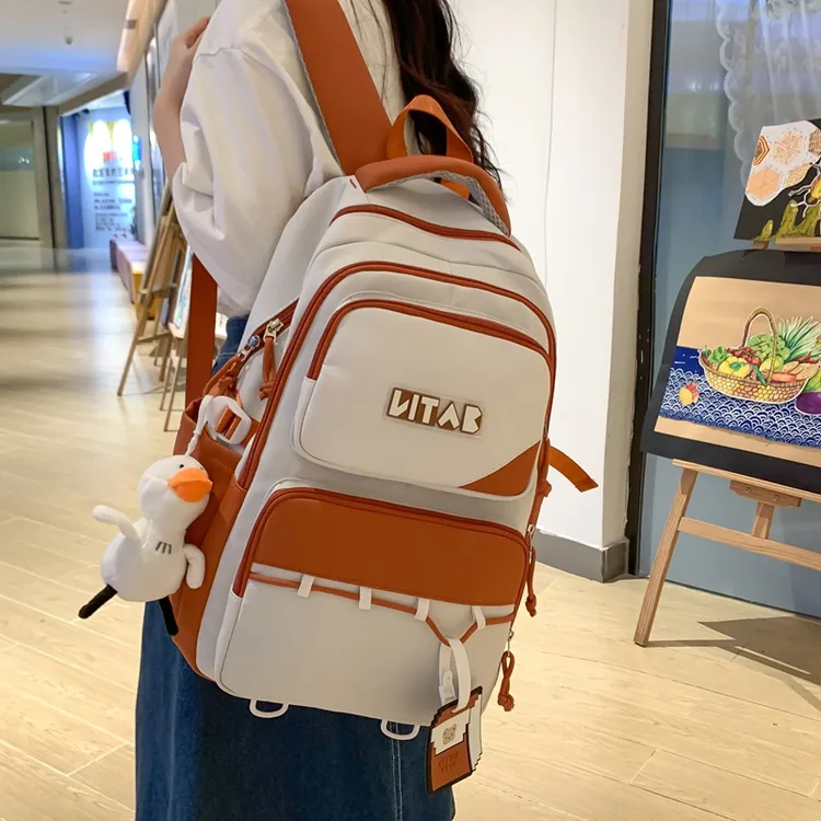 大学生女初中生减负双肩包高中生小学生日系简约大容量电脑旅行包