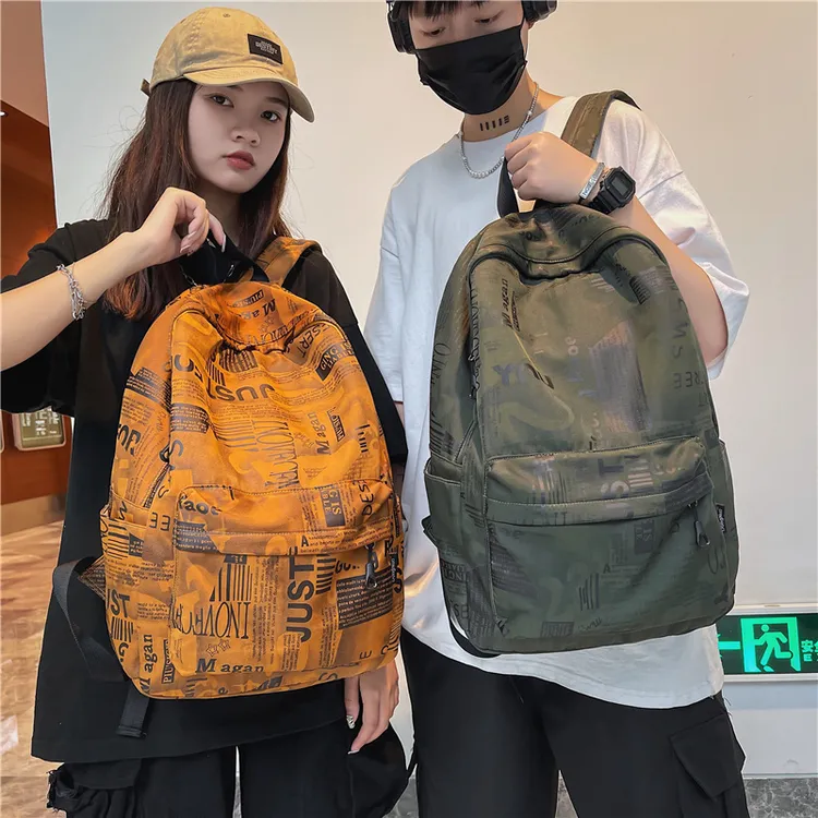 韩版潮流男女学生双肩包大容量尼龙旅行包电脑包简约百搭背包个性