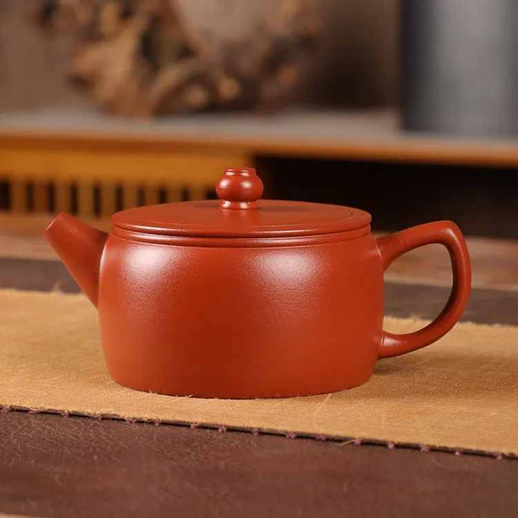 正品宜兴紫砂茶壶茶具可提可转可凤鸣橘皮朱泥汉瓦壶大容量紫砂壶