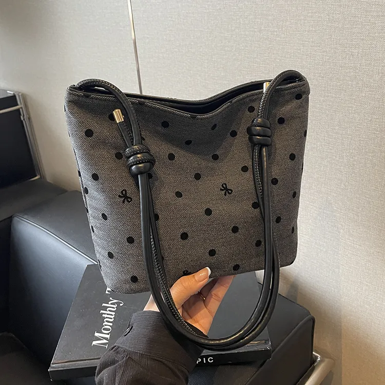 艾米兔 X COOLE女包2025新款百搭简约时尚潮流水桶包单肩斜挎包