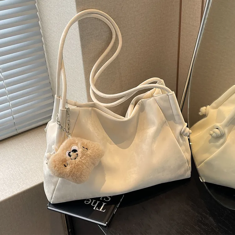 艾米兔 X COOLE女包2025新款百搭大容量可爱挂件通勤单肩托特包