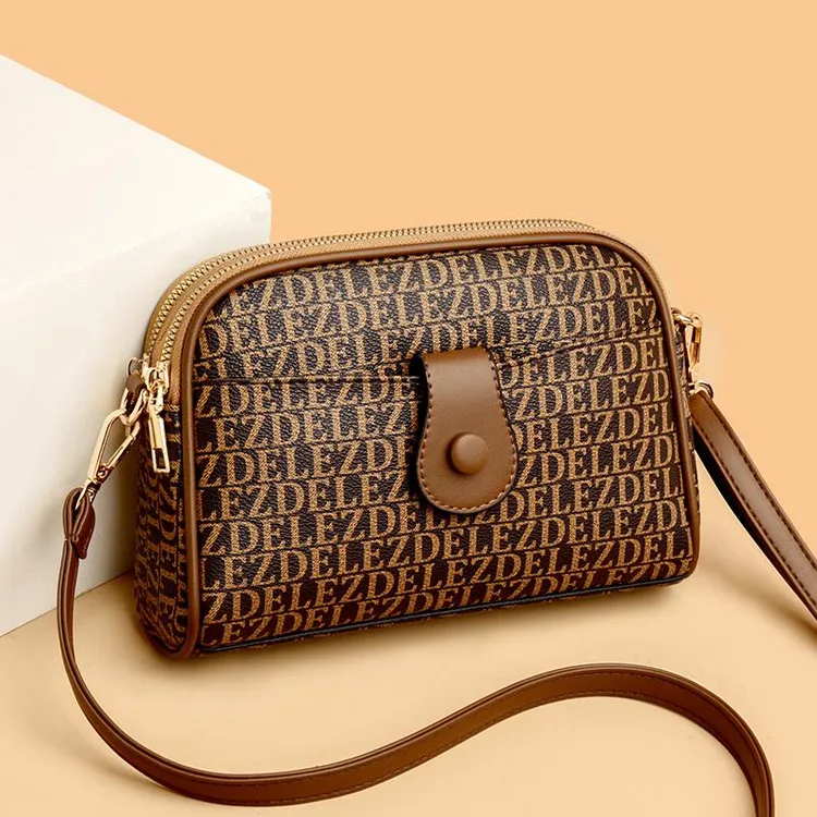 米琦袋鼠中年女士手机包2025新款时尚斜挎包休闲简约百搭送妈妈包