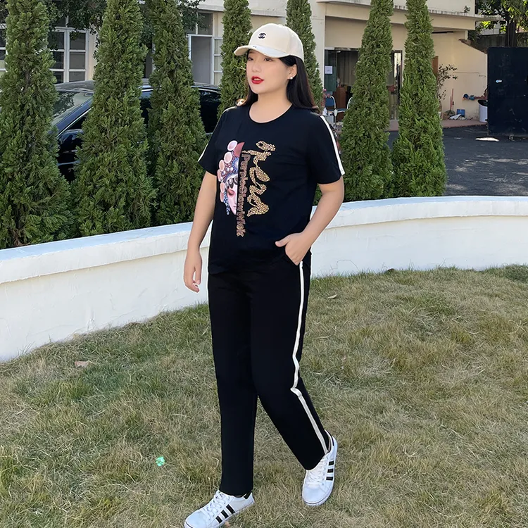 胖mm休闲运动套装女2025夏季新款大码遮肚显瘦烫钻短袖两件套黑色