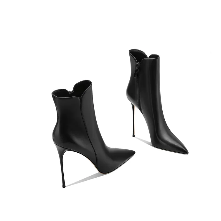 黑色加绒时髦弹力瘦瘦靴中筒靴2025冬季新款尖头细跟百搭高跟鞋