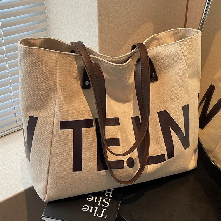 帆布通勤托特包女大容量2025新款休闲夏季百搭单肩包大学生上课包