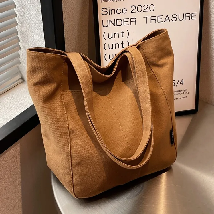 夏季大容量帆布包包女2025新款时尚简约单肩布袋大学生通勤托特包