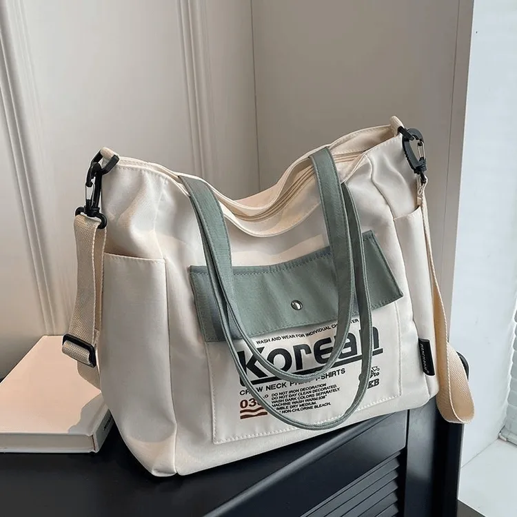 大容量帆布包包2025新款大学生上课补习袋百搭通勤单肩斜挎托特包