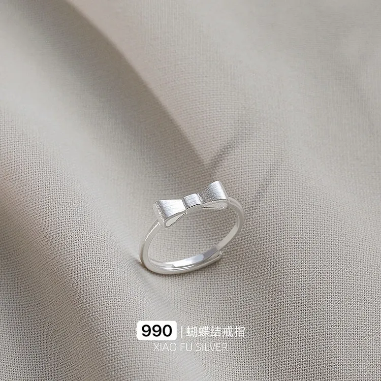 足银戒指 纯银990蝴蝶结戒指女磨砂爱心蝴蝶结在逃公主可调节戒指