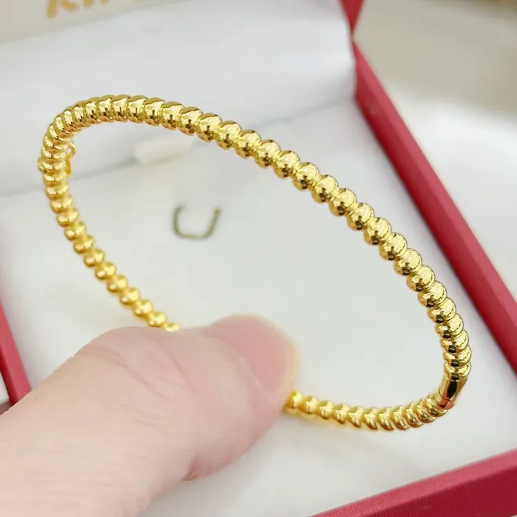 18K金潮牌POPPY珠珠椭圆贵妃手镯91210黄金色光面约7.0-9.0克