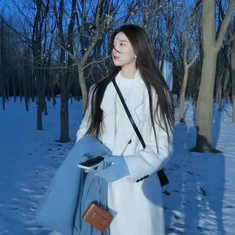 白色保暖羽绒呢子大衣女2025新款冬季今年流行加厚长款毛呢外套