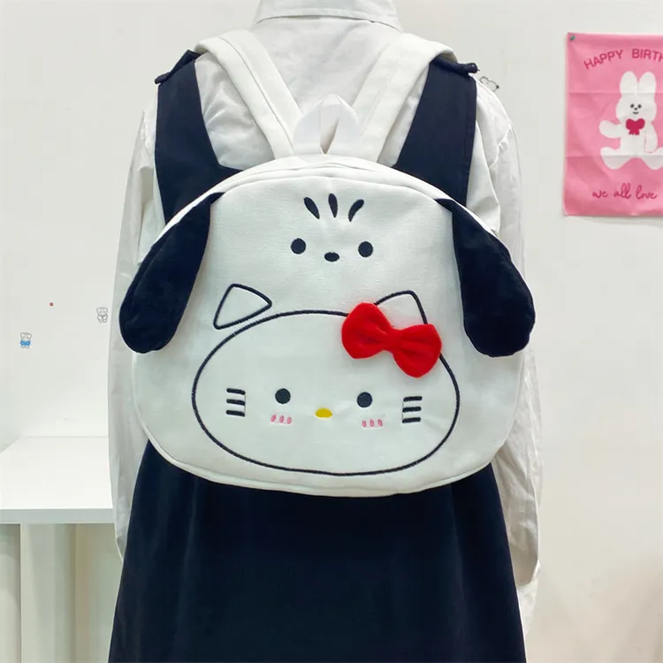 小白狗双肩包个性可爱小狗卡小猫帆布背包大容量高中初中学生书包