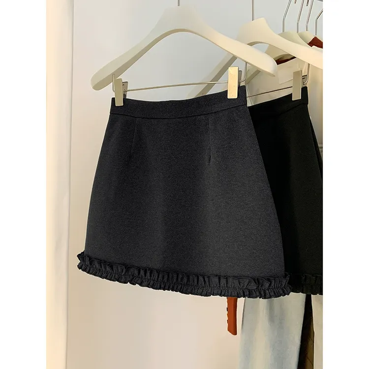 花苞拼接a字毛呢短裙女2025秋季新款高腰百搭显瘦设计包臀半身裙