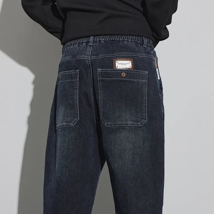 男士牛仔裤秋冬厚款2025新款广州弹力宽松小脚松紧腰抽绳哈伦裤子