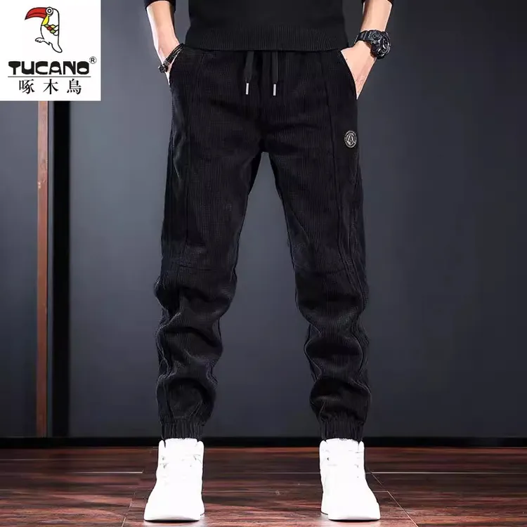 啄木鸟2025秋冬季灯芯绒休闲裤男加绒加厚宽松大码束脚运动裤子男