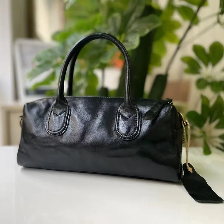 zizi【人气款】保龄球经典百搭手抓纹真皮植鞣皮斜挎包手提包包