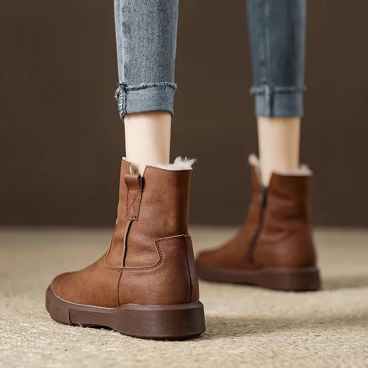 万达撤柜头层牛皮复古马丁靴女款冬季皮毛一体雪地靴2025软底保暖