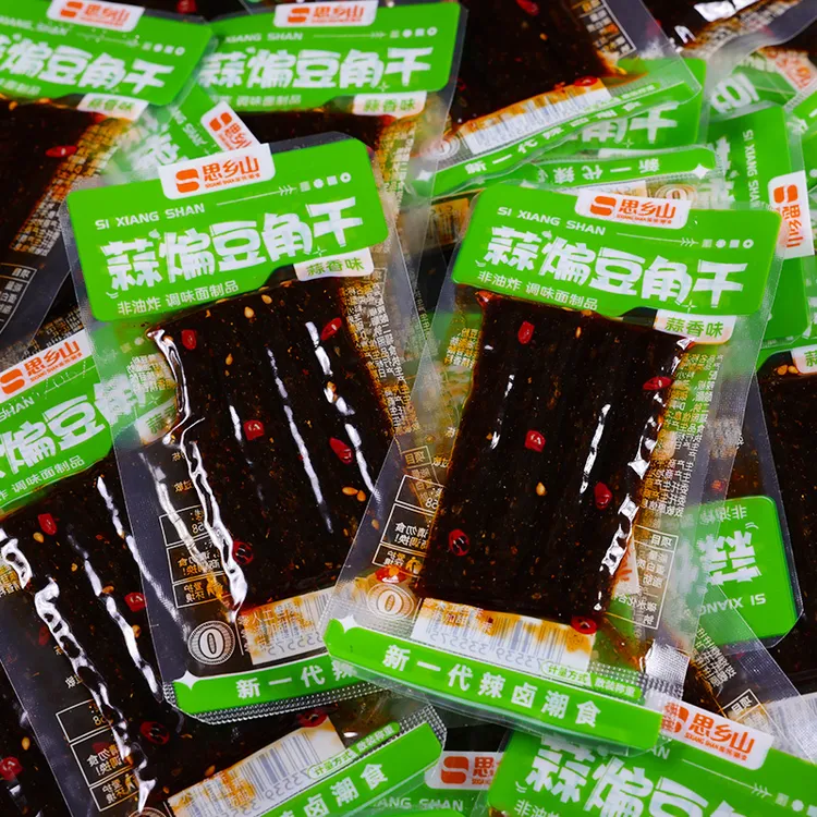 思乡山蒜香豆角干辣条儿时怀旧麻辣小面筋批发童年零食开袋即食