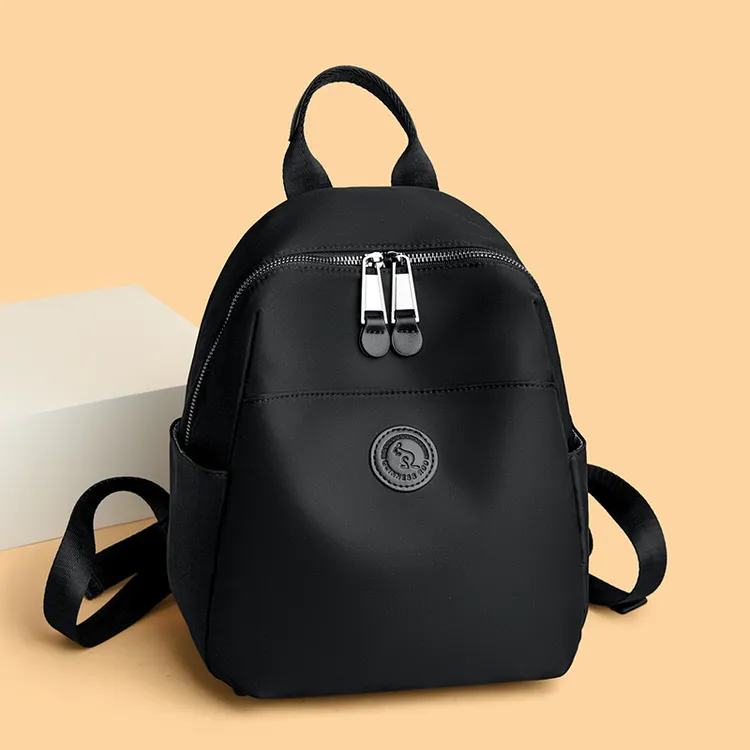 网红双肩包女牛津布轻便旅行背包女士大容量通勤时尚初中女生书包