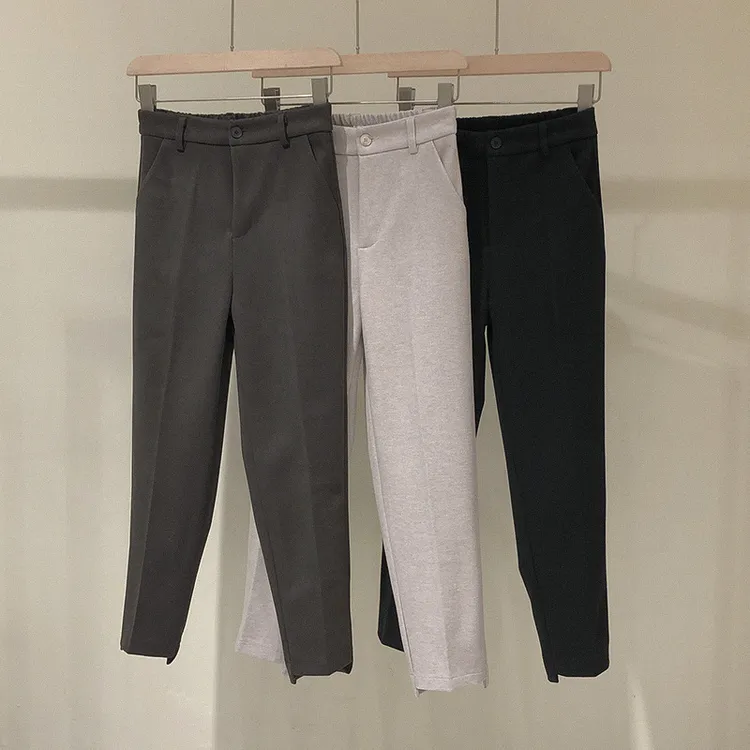 全球好物丨2024秋冬毛呢烟管裤裤脚不对称小设计 九分奶奶裤女