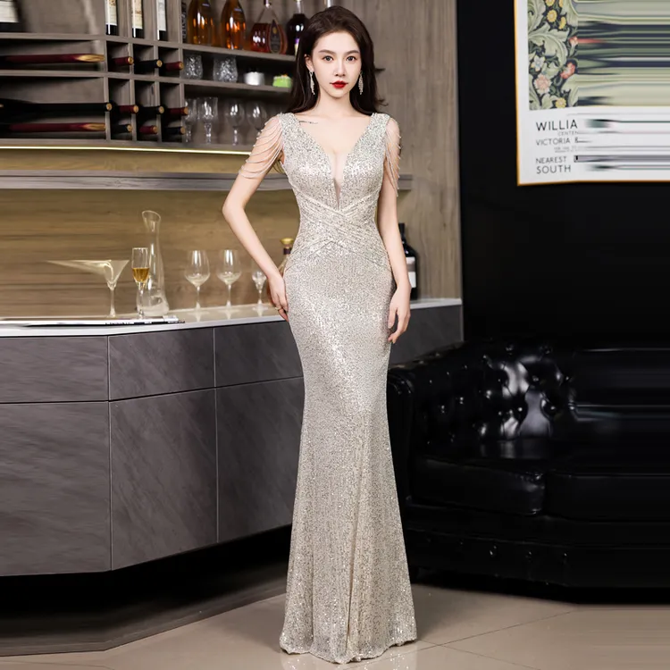 年会晚礼服女2024新款轻奢小众设计感高端亮片主持人设计感香槟色