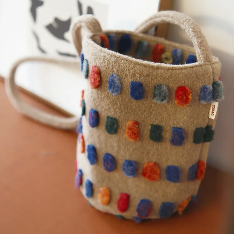 SoBag秋冬撞色波点毛呢斜挎水桶布包女小众毛茸茸休闲单肩小包