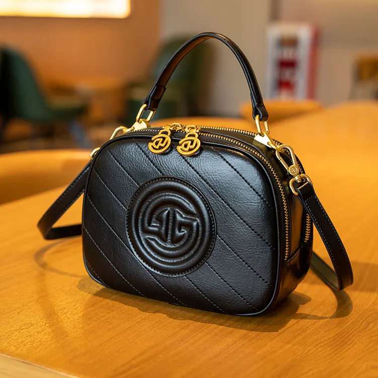 戈兰黛品牌女包2025新款大容量通勤小圆包百搭单肩斜挎手提包9631