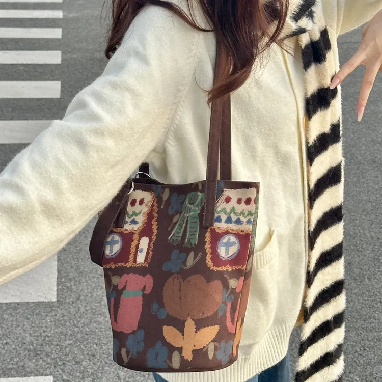 弘娜x耳 原创百搭小众单肩手提斜跨水桶包休息文艺通勤包包女包