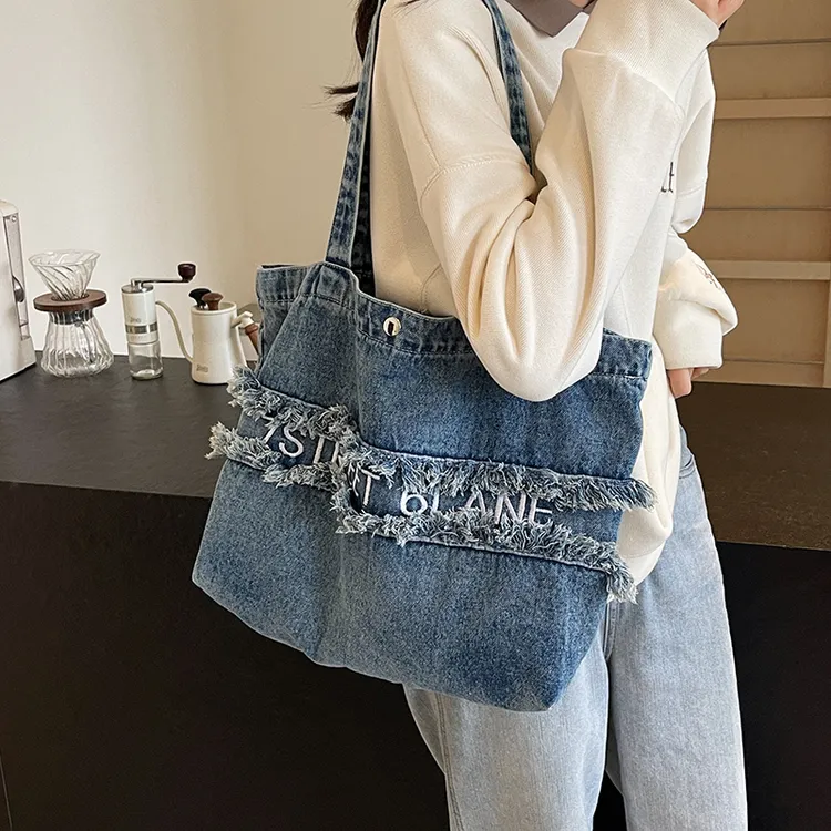 时尚休闲大包包女2024新款百搭大容量通勤女单肩包大学生上课书包