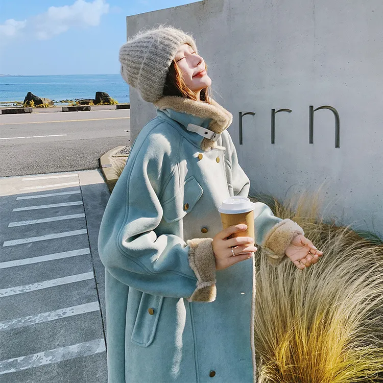 蓝色慵懒风皮毛一体外套女秋冬季2025新款设计感加绒加厚长款大衣