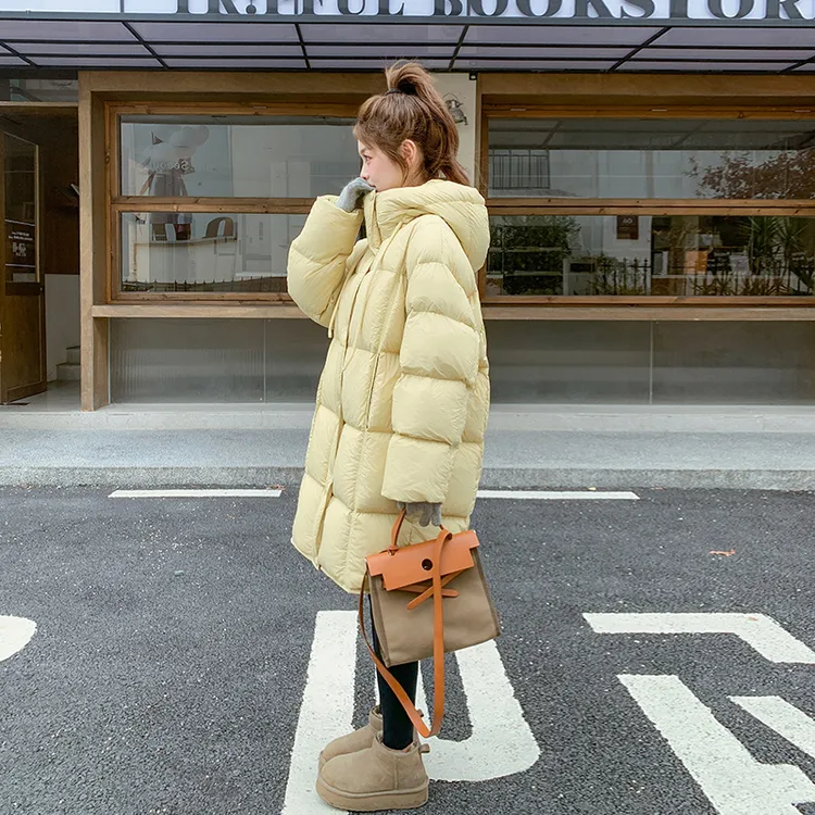 奶黄色羽绒服女2025冬季新款韩系甜美加厚保暖中长款90白鸭绒外套