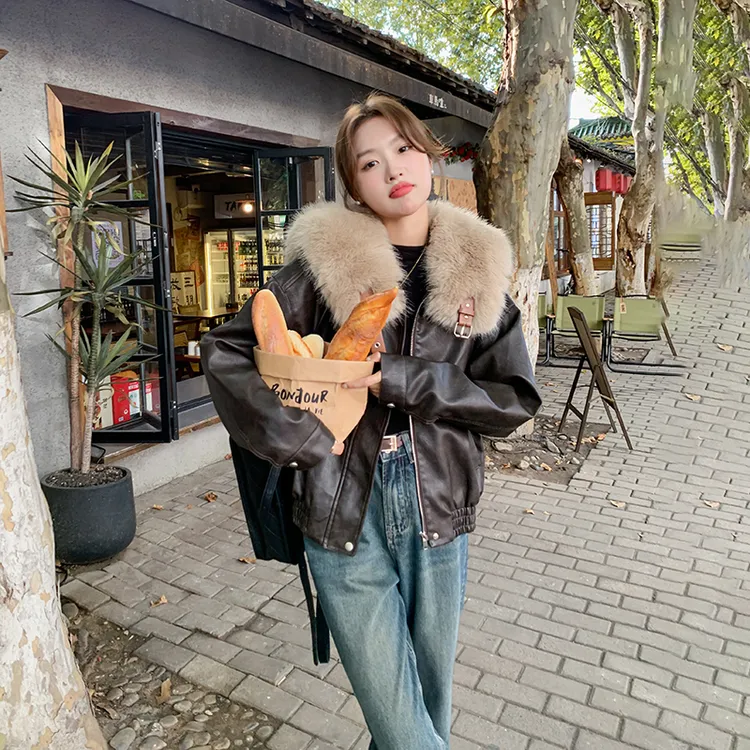 皮毛一体大毛领外套女2025冬季新款炸街设计感加绒加厚机车服上衣