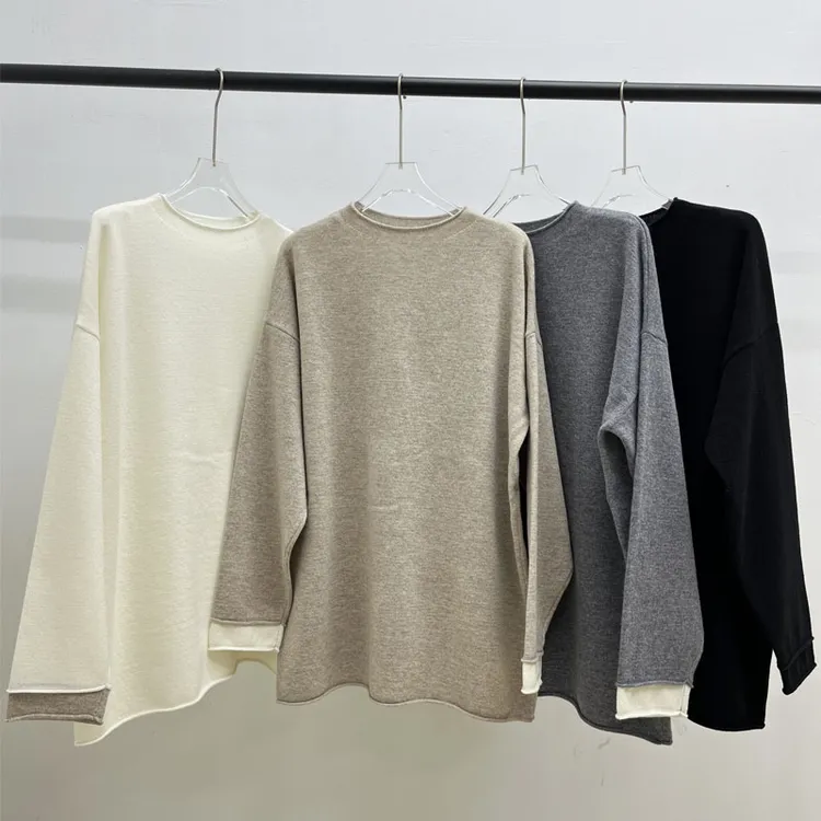 100%羊毛卷边圆领宽松廊型长袖休闲慵懒针织宽松简约袖拼撞色毛衣