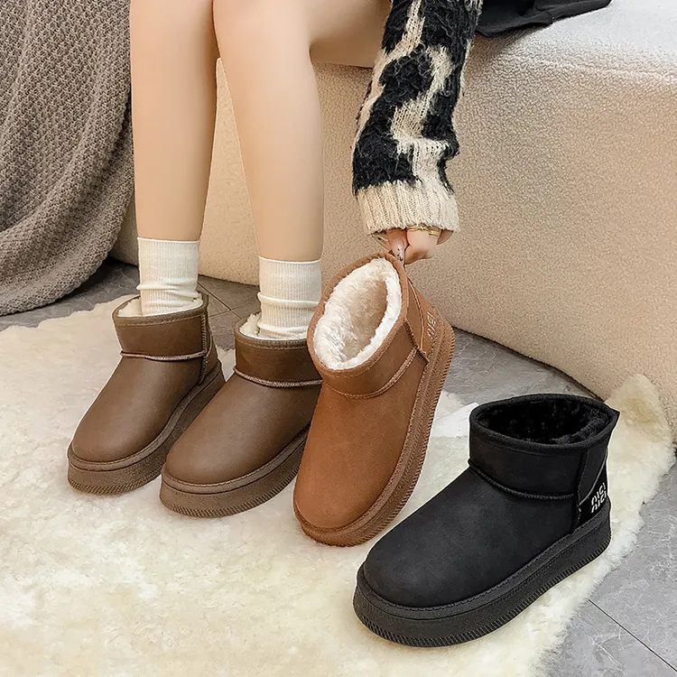 户外雪地靴女皮毛一体防水防滑靴子女冬靴厚底加绒短靴东北大棉鞋