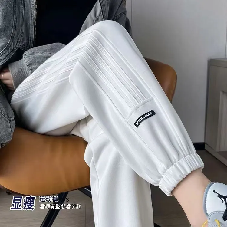 啄木鸟秋冬新款休闲运动裤女韩版高腰宽松束脚显瘦休闲百搭哈伦裤