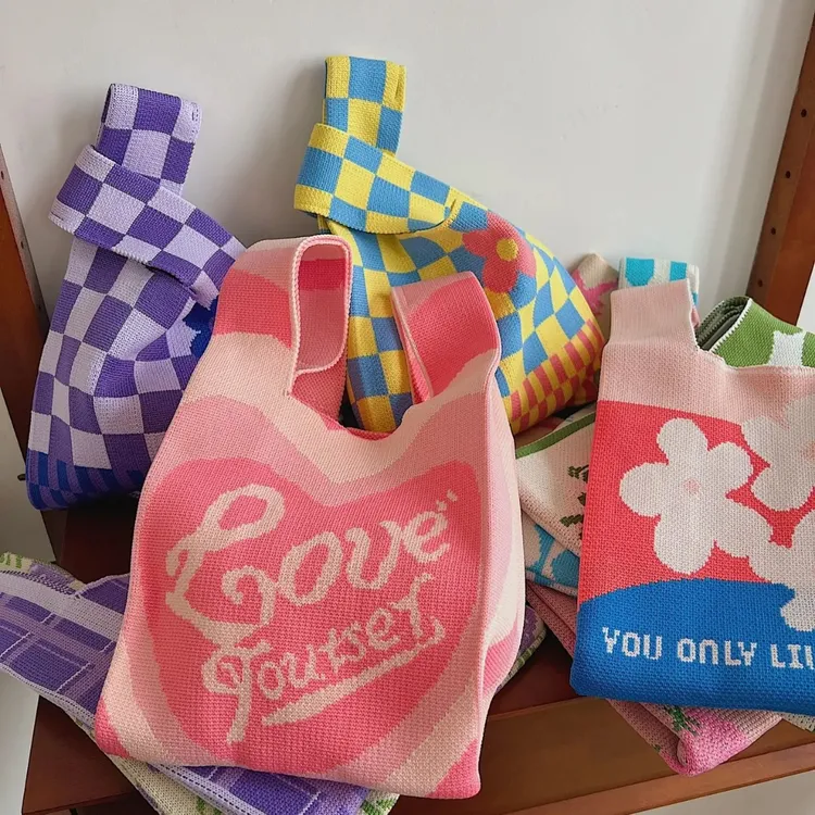 网红新款针织包手腕包高级感ins风百搭针织手提包伴手礼包小众