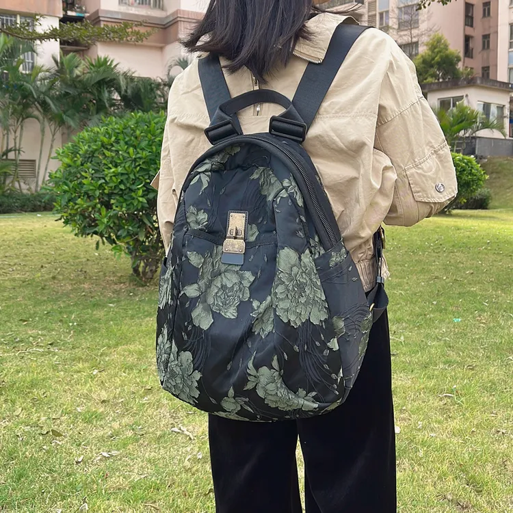 双肩包女新款国潮风户外轻便运动休闲包多功能旅行背包书包行李袋