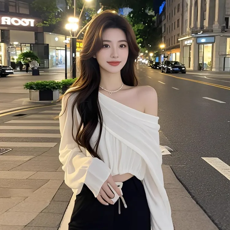 春季穿搭辣妹纯欲拼接风斜领上衣2025新款法式别致露肩外穿雪纺衫