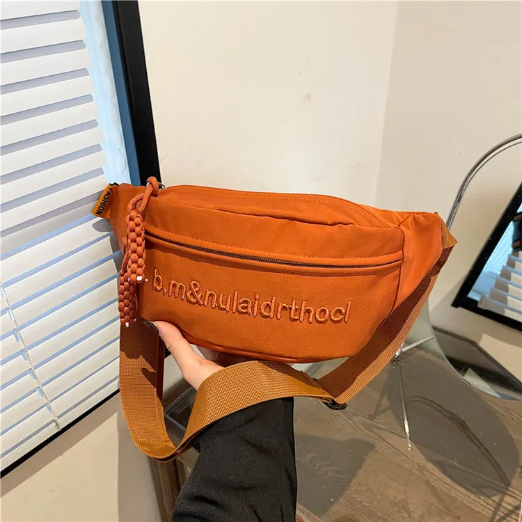 手机包刺绣腰包潮牌男女胸包日系轻便单肩小背包女休闲运动斜挎包