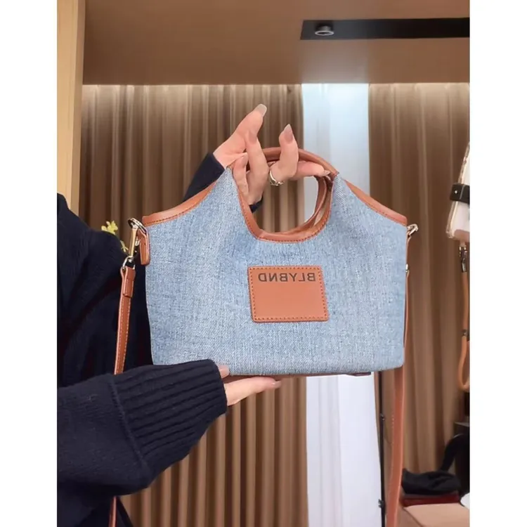 玖了个玖 2025秋季新品极简百搭撞色牛仔手提斜挂包 2509C5451