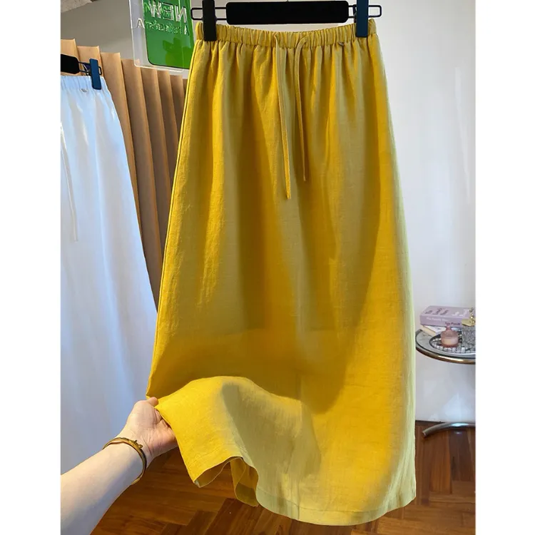 老钱风黄色棉麻半身裙女高端2025夏季新款宽松百搭中长款裙子
