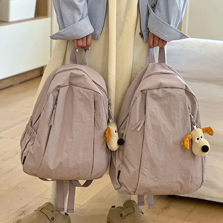 旅游轻便高级感小众双肩包大学生通勤初中女生书包日韩系简约背包
