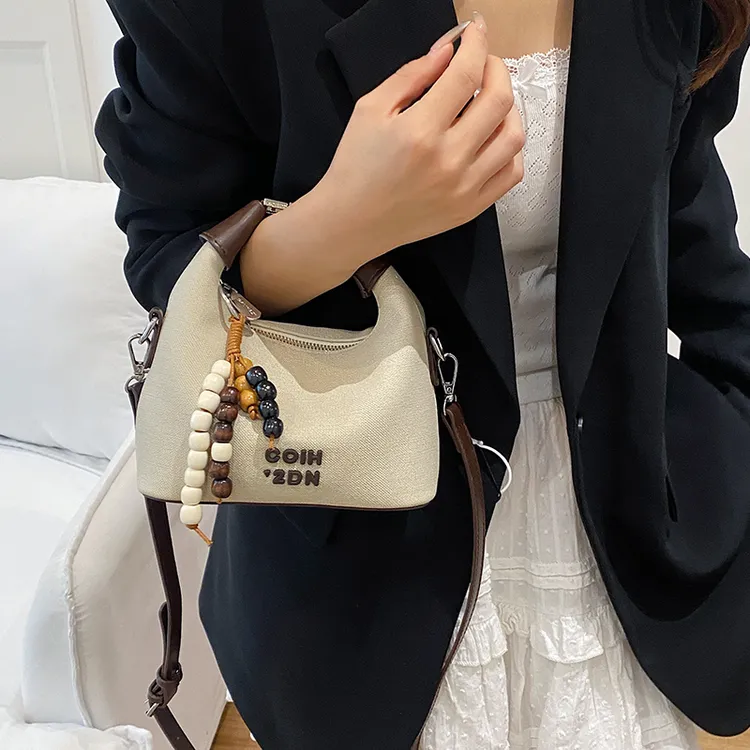 高级感韩版通勤小包包女2025新款小众百搭休闲饺子包单肩斜挎包