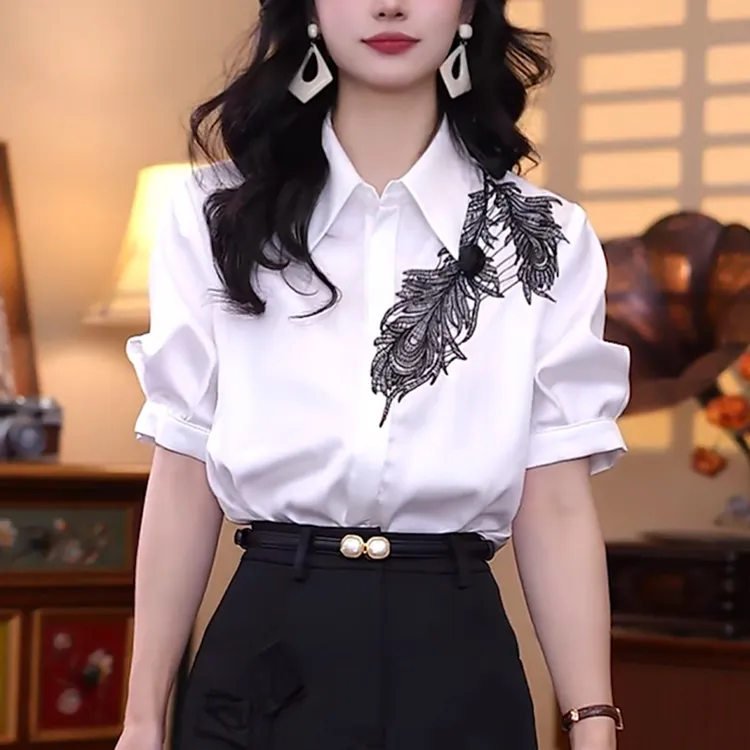 2025夏季新款白色短袖衬衫女洋气减龄宽松休闲显瘦设计感印花上衣
