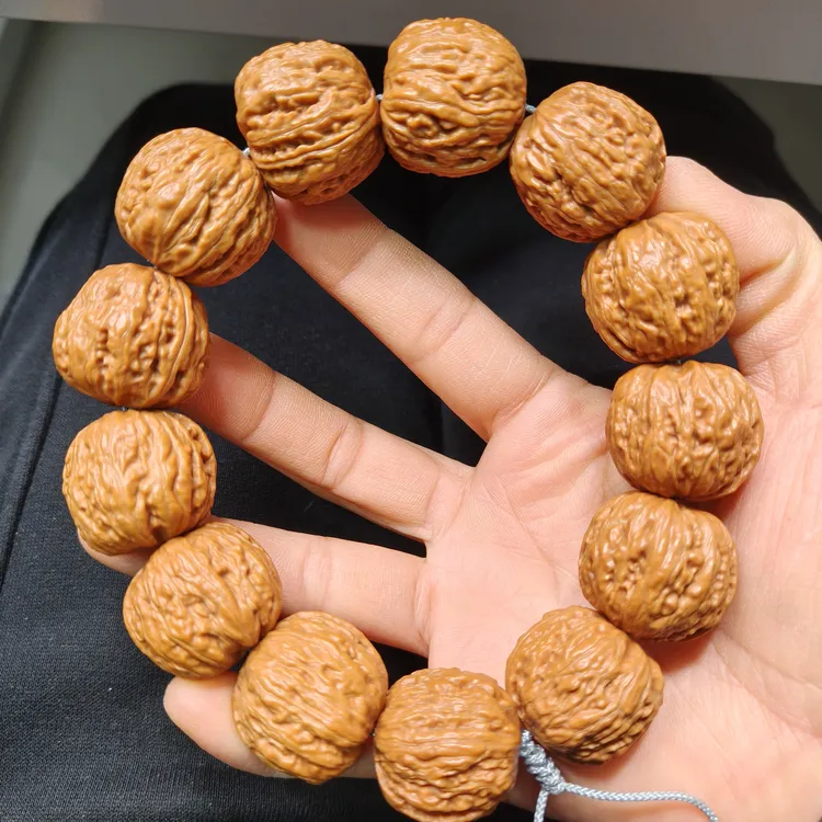 25mm超大个珊瑚大肉墩核桃手串