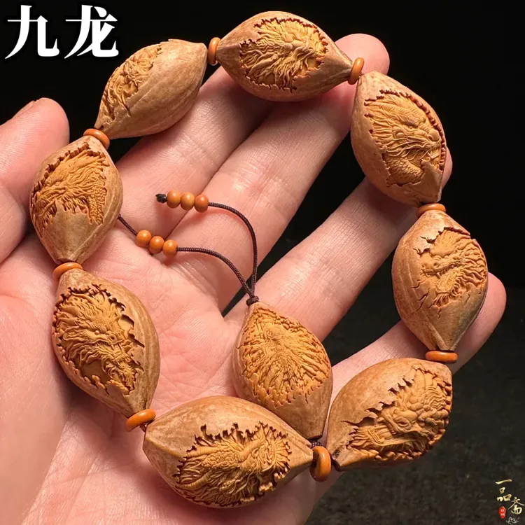 包衣九龙高端橄榄核手串男款盘玩核雕浅浮雕文玩精雕男士手链女款