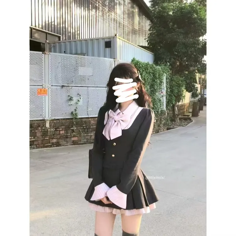 新款早秋学院风拼接蝴蝶结连衣裙设计感长袖春款辣妹显瘦甜美短裙