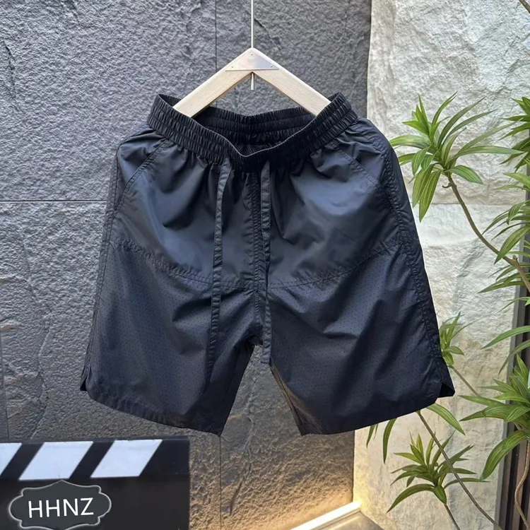 短裤打孔夏季休闲大学生夏季短裤潮流绿色弹力休闲裤