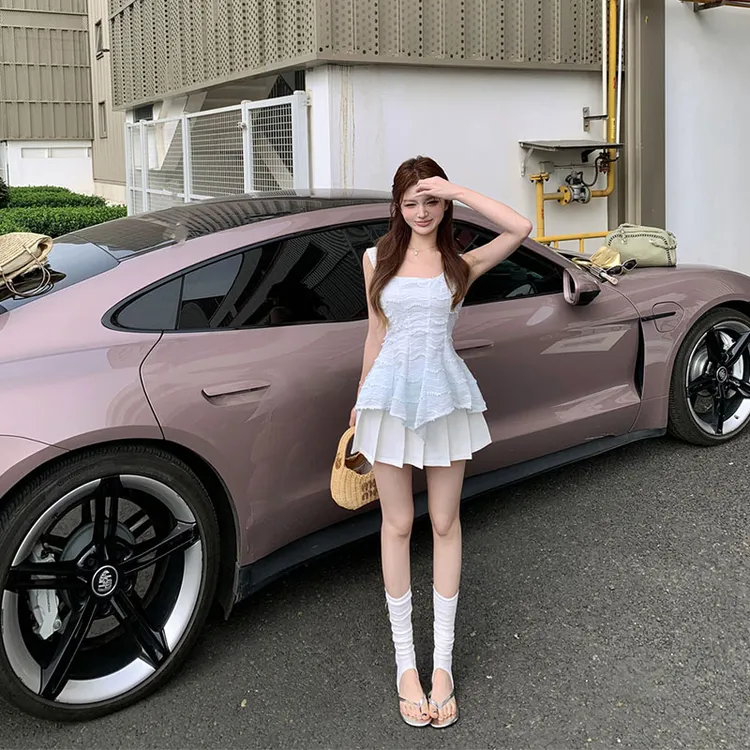 2025夏季新款无袖背心女收腰不规则下摆显瘦上衣+百褶短裙两件套