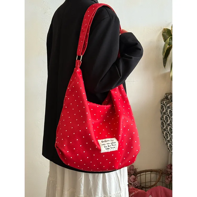 韩系简约波点帆布包2025新款大容量单肩斜挎包小众通勤托特包