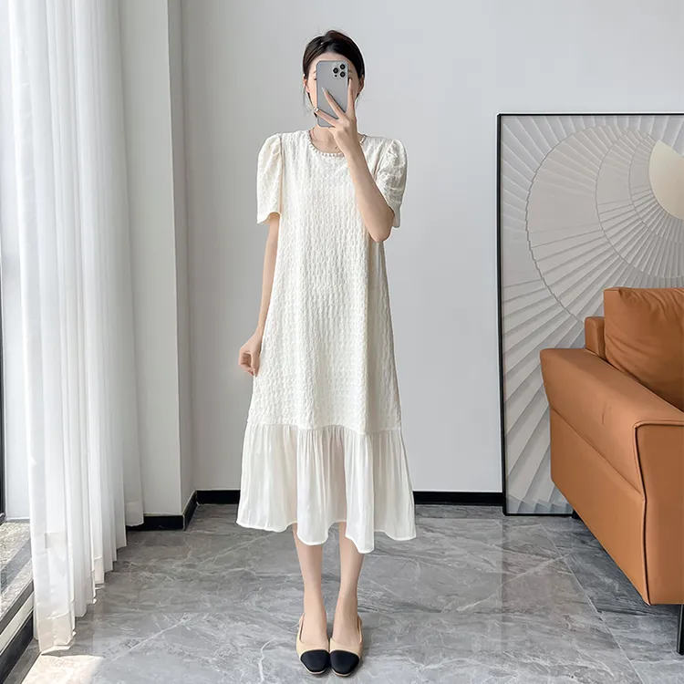2025夏季新款时尚显瘦长款过膝白色简约大气拼接下摆直筒连衣裙女